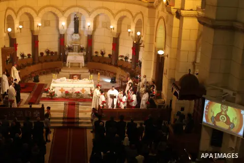 Christians attend Christmas mass in Cairo, on December 24, 2012. Photo by Ashraf Amra