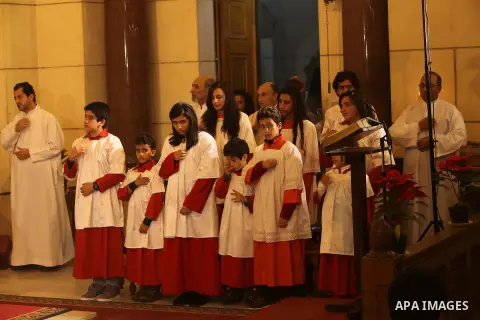 Christians attend Christmas mass in Cairo, on December 24, 2012. Photo by Ashraf Amra
