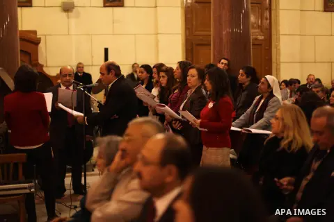 Christians attend Christmas mass in Cairo, on December 24, 2012. Photo by Ashraf Amra