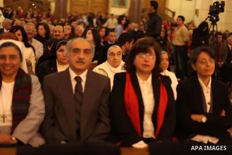 Christians attend Christmas mass in Cairo, on December 24, 2012. Photo by Ashraf Amra
