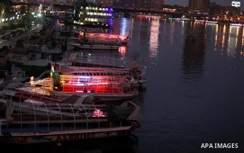 Boats parked waiting for customers on the Nile river, in Cairo, Egypt, Dec. 25, 2012. Boat rides for many Egyptians are part of the nightlife culture. Photo by Ashraf Amra