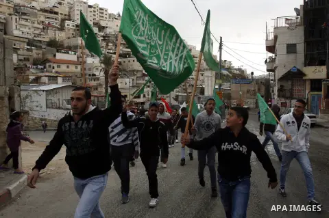 Palestinians celebrate after the Israeli authorities released prisoner Mousa Oudeh from neighborhood of Silwan in Jerusalem on December 26, 2012. Oudeh is a member of the committee for the defense of Silwan, spent two mo...