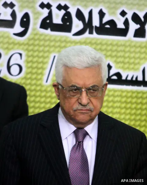 Palestinian President Mahmoud Abbas, attends a meeting of his Fatah Party, at his headquarter in the West Bank city of Ramallah, 26 December 2012. Photo by Issam Rimawi