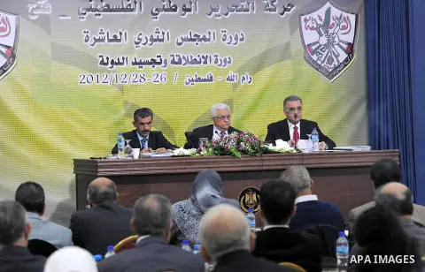 Palestinian Authority President and head of the Fatah movement Mahmud Abbas attends a Fatah "Revolutionary Council" meeting in the Palestinian West Bank city of Ramallah along with top officials, on December 26, 2012. Ph...