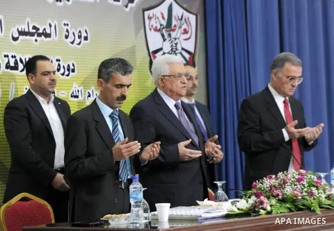 Palestinian Authority President and head of the Fatah movement Mahmud Abbas attends a Fatah "Revolutionary Council" meeting in the Palestinian West Bank city of Ramallah along with top officials, on December 26, 2012. Ph...