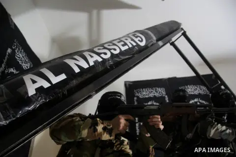 Militants of El-Naser Salah El-Deen brigades of the popular resistance, during they prefabricate a homemade rockets named (Al Naser 5) , marking the 4 th anniversary of the Israel-Gaza war, in Gaza City, on Dec. 27, 2012...