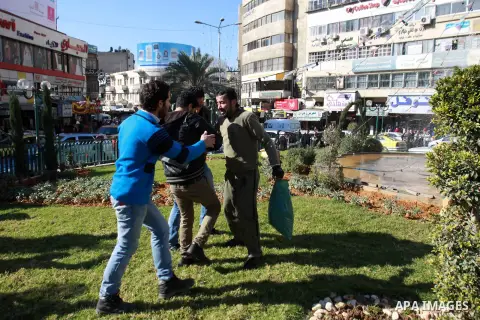 Palestinians stop Jomaa Abu Olifa, 47 years as he pours gasoline trying to set himself on fire during a demonstration against the economic situation and against Palestinian Prime Minister Salam Fayyad in the northern Wes...