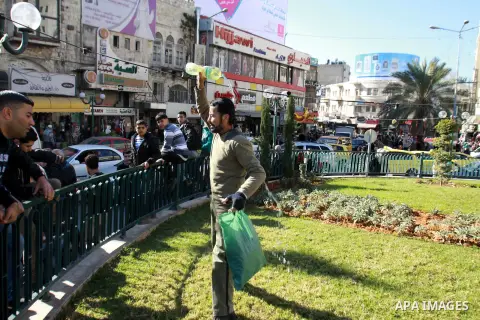 Jomaa Abu Olifa, 47 years, a Palestinian man pours gasoline trying to set himself on fire during a demonstration against the economic situation and against Palestinian Prime Minister Salam Fayyad in the northern West Ban...