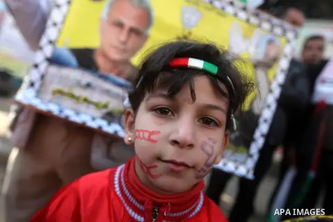 Palestinian children gather during a rally in Gaza city on December 31, 2012. in solidarity with hunger-striking detainees held by Israel to demand their release from detention without trial. Photo by Majdi Fathi