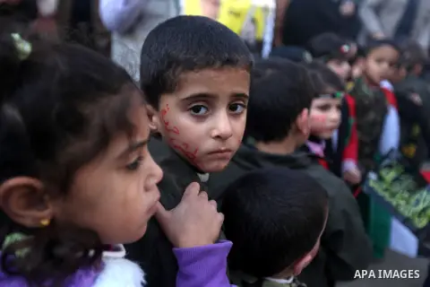 Palestinian children gather during a rally in Gaza city on December 31, 2012. in solidarity with hunger-striking detainees held by Israel to demand their release from detention without trial. Photo by Majdi Fathi