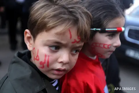 Palestinian children gather during a rally in Gaza city on December 31, 2012. in solidarity with hunger-striking detainees held by Israel to demand their release from detention without trial. Photo by Majdi Fathi