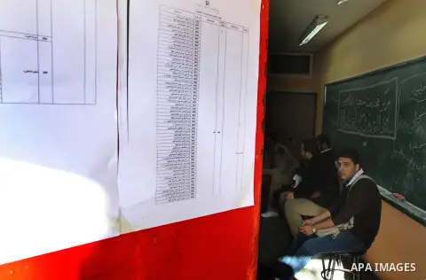 Palestinians update their details at a centre run by the Palestinian Central Election Commission (CEC), in Gaza city on February 12, 2013. The Palestinian Central Election Commission (CEC) began on Monday registering vot...