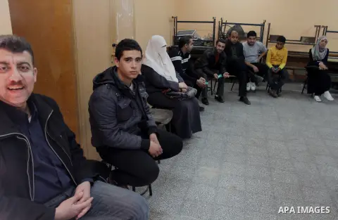 Palestinians update their details at a centre run by the Palestinian Central Election Commission (CEC), in Gaza city on February 12, 2013. The Palestinian Central Election Commission (CEC) began on Monday registering vot...