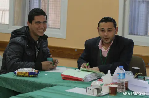 Palestinians update their details at a centre run by the Palestinian Central Election Commission (CEC), in Gaza city on February 12, 2013. The Palestinian Central Election Commission (CEC) began on Monday registering vot...