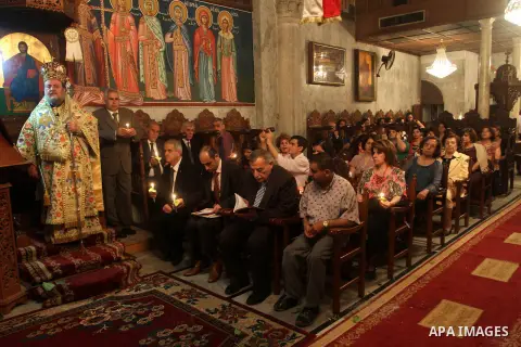Palestinian Orthodox celebrate Holy Fire ceremony at the Saint Porfirios church in Gaza City early Gaza City May 05, 2013. Photo by Naaman Omar