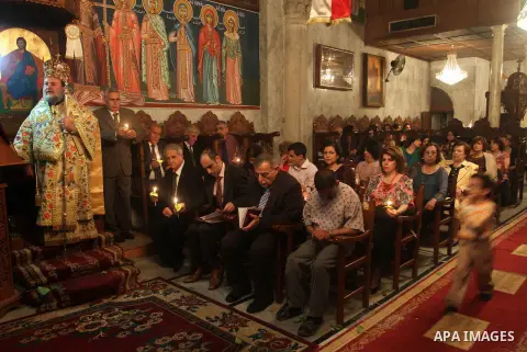 Palestinian Orthodox celebrate Holy Fire ceremony at the Saint Porfirios church in Gaza City early Gaza City May 05, 2013. Photo by Naaman Omar