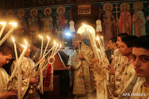 Palestinian Orthodox celebrate Holy Fire ceremony at the Saint Porfirios church in Gaza City early Gaza City May 05, 2013. Photo by Naaman Omar