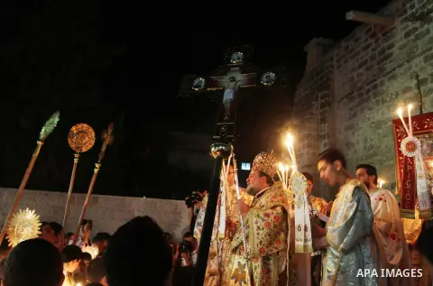 Palestinian Orthodox celebrate Holy Fire ceremony at the Saint Porfirios church in Gaza City early Gaza City May 05, 2013. Photo by Naaman Omar