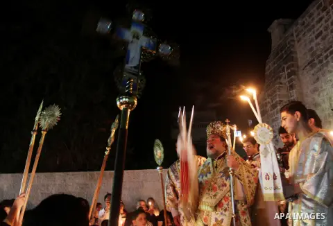 Palestinian Orthodox celebrate Holy Fire ceremony at the Saint Porfirios church in Gaza City early Gaza City May 05, 2013. Photo by Naaman Omar