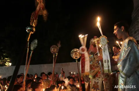 Palestinian Orthodox celebrate Holy Fire ceremony at the Saint Porfirios church in Gaza City early Gaza City May 05, 2013. Photo by Naaman Omar