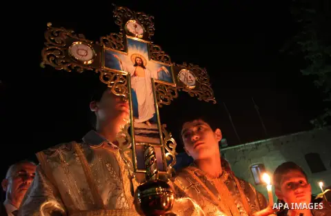 Palestinian Orthodox celebrate Holy Fire ceremony at the Saint Porfirios church in Gaza City early Gaza City May 05, 2013. Photo by Naaman Omar