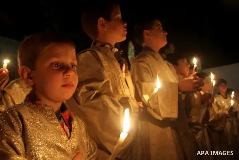 Palestinian Orthodox celebrate Holy Fire ceremony at the Saint Porfirios church in Gaza City early Gaza City May 05, 2013. Photo by Naaman Omar