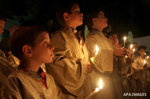 Palestinian Orthodox celebrate Holy Fire ceremony at the Saint Porfirios church in Gaza City early Gaza City May 05, 2013. Photo by Naaman Omar