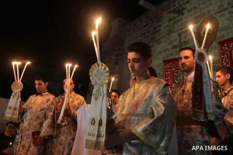 Palestinian Orthodox celebrate Holy Fire ceremony at the Saint Porfirios church in Gaza City early Gaza City May 05, 2013. Photo by Naaman Omar