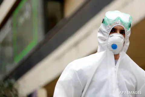 Lebanen workers spray disinfectant as a preventive measure amid fears of the spread of the coronavirus at area of Dbayeh, north of Beirut, on March 30, 2020. Photo by Marwan Bou Haidar