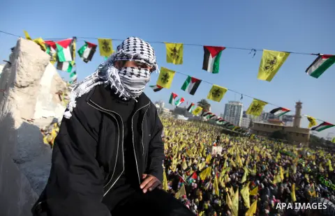 Palestinians take part in a rally marking the 48th anniversary of the founding of the Fatah movement, in Gaza City January 4, 2013. Hundreds of thousands of Palestinians joined a rare rally staged by President Mahmoud Ab...