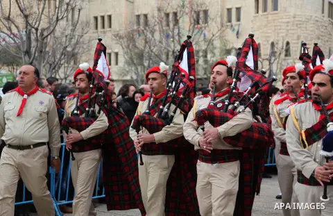 Palestinian scouts perform during the visit of the Greek Orthodox Patriarch of the Holy Land to the Church of the Nativity, the place accepted by Christians where Jesus Christ was born to the Virgin Mary, as he emerges f...