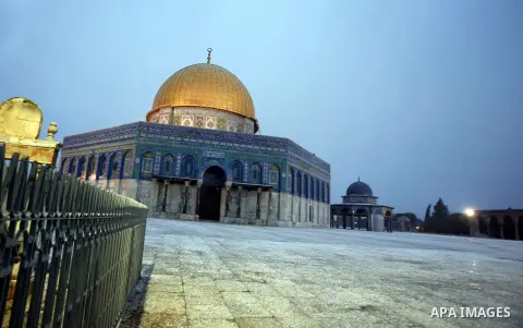 An overview of Jerusalem, on January 9, 2013. as a snow storm rolls into the city with waves of sleet, hail and high winds. Photo by Mahfouz Abu Turk