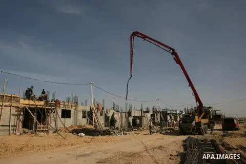Palestinians work at a construction site in Rafah in the southern Gaza Strip on Jan. 16, 2013. Israel allowed the entry of gravels into the Gaza Strip on Dec. 30, 2012 for the first time since it imposed a tight blockade...
