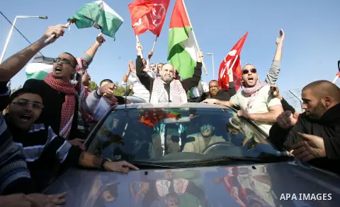 Former Palestinian prisoner Jihad Abedi is greeted following his release from an Israeli jail after serving 25 years, in Jerusalem on January 20, 2013. Photo by Mahfouz Abu Turk