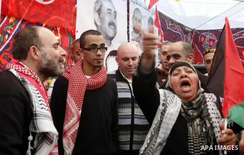 Former Palestinian prisoner Jihad Abedi is greeted following his release from an Israeli jail after serving 25 years, in Jerusalem on January 20, 2013. Photo by Mahfouz Abu Turk
