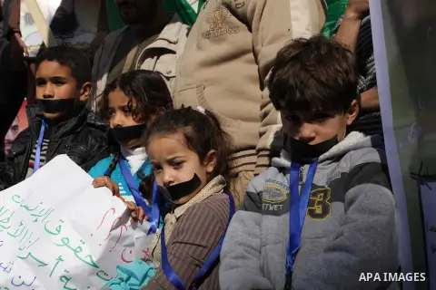 Palestinian chidren take part in a protest calling for the release of Palestinian prisoners from Israeli jails in front of the Red cross office in Gaza city, Jan. 21, 2013. Photo by Ashraf Amra