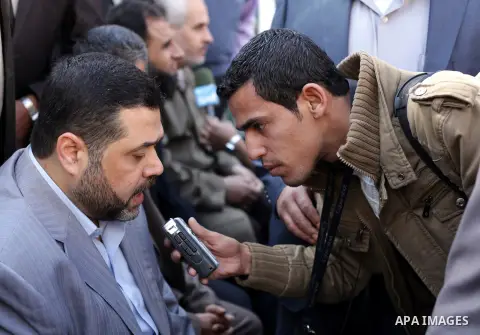 Hamas representative in Lebanon Osama Hamdan participate in a protest calling for the release of Palestinian prisoners from Israeli jails in front of the Red cross office in Gaza city, Jan. 21, 2013. Photo by Ashraf Amra