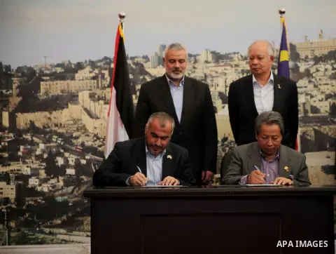 Palestinian Prime Minister Ismail Haniyeh, meets with Malaysian Prime Minister Najib Razak, in Gaza City , Jan. 22, 2013. During his first-ever visit to the territory , Najib Razak is meeting with Hamas politicians, tour...