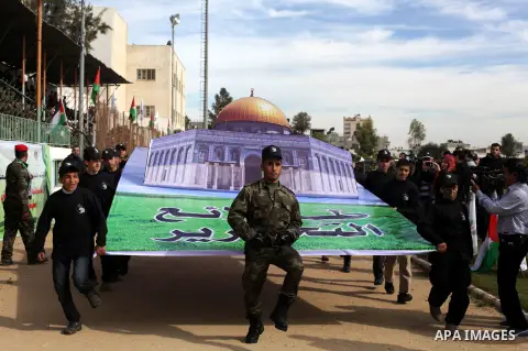 Palestinian youths display their skills during scouts training in Gaza city, on January 24, 2013. Palestinian ministry of education and higher education organized a camp to train Palestinian boy scouts for discipline, ar...