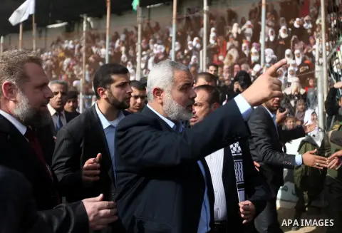 Palestinian Prime Minister in Gaza strip Ismail Haniyeh attends a graduation ceremony for martial arts course organized by Palestinian ministry of education in Gaza City January 24, 2013. Photo by Majdi Fathi