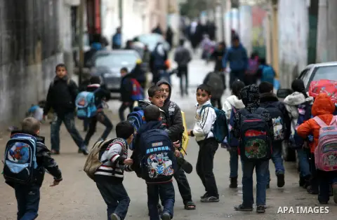 Palestinian students back from their school after a study day in the southern Gaza strip town of Rafah, Jan. 31, 2013. Photo by Eyad Al Baba