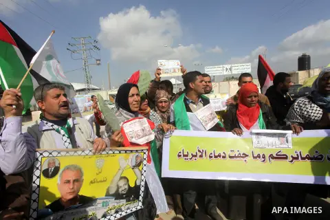Palestinians take part in a reception tent as they wait the arrival of the released prisoner Akram Rikhawi near the Erez crossing northen Gaza strip on February 07, 2013. Rikhawi from Gaza was arrested by Israeli occupat...