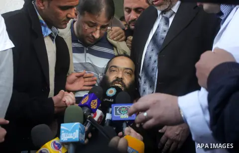 Former Palestinian prisoner Akram Rikhawi speaks to media at al-Shifa hospital upon his arrival to Gaza strip, in Gaza city on February 07, 2013. Rikhawi from Gaza was arrested by Israeli occupation forces in 2004 and se...