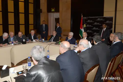Palestinian President Mahmoud Abbas meets with the commission of activate and develop the Palestinian Liberation Organization (PLO) in Cairo, on February 08, 2013. Photo by Thaer Ganaim