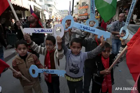 Supporters of the Palestinian People's Party take part in a rally celebrating the 31st anniversary of its establishment in the West Bank city of Nablus, on Feb. 09, 2013. Photo by Nedal Eshtayah
