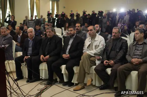 Palestinians participate in press conference in Gaza City on Feb. 11, 2013. Electoral registration centers opened in the Gaza Strip on Monday, the first step towards holding long-overdue Palestinian national elections. P...