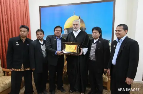 Palestinian Prime Minister in Gaza strip, Ismail Haniyeh receives A delegation of Indonesia, in Gaza city, on Feb. 17, 2013. Photo by Ahmed Shaat