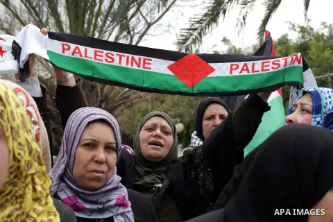 Palestinian women gather for a demonstration calling for the end of the political division between the Gaza Strip Hamas-led leadership and the Palestinian Authority Fatah-led in Gaza city, on Feb. 19, 2013. Photo by Ashr...