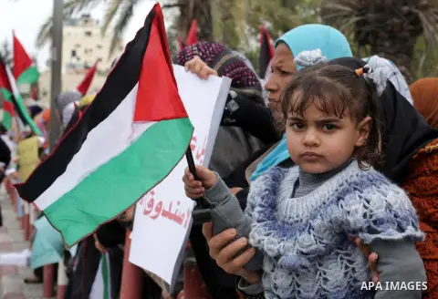 Palestinian women gather for a demonstration calling for the end of the political division between the Gaza Strip Hamas-led leadership and the Palestinian Authority Fatah-led in Gaza city, on Feb. 19, 2013. Photo by Ashr...