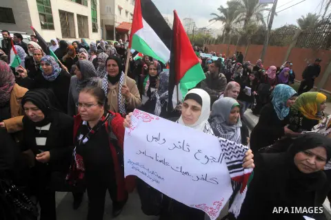 Palestinian women gather for a demonstration calling for the end of the political division between the Gaza Strip Hamas-led leadership and the Palestinian Authority Fatah-led in Gaza city, on Feb. 19, 2013. Photo by Ashr...